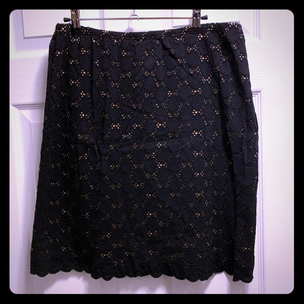 Black lace skirt. Below the knee. Nude lining. XL